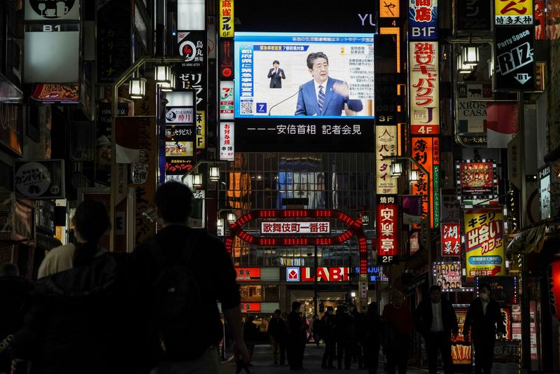 Japan's battle with pandemic may mark end of Abe's fiscal experiment